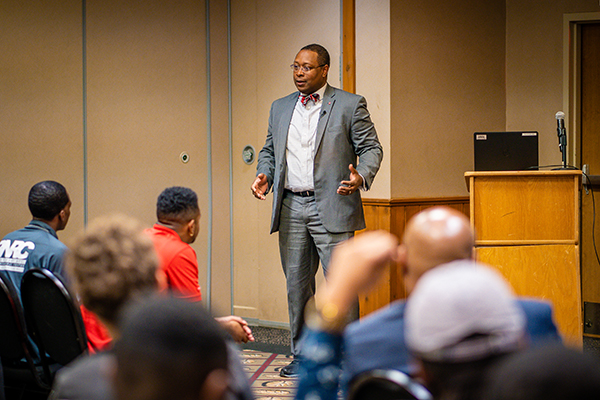 James Moore of Ohio State speaking in front of a classroom
