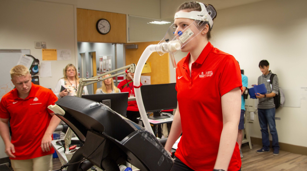 Ohio State Kinesiology students viewing student walking on a treadmill in oxygen mask