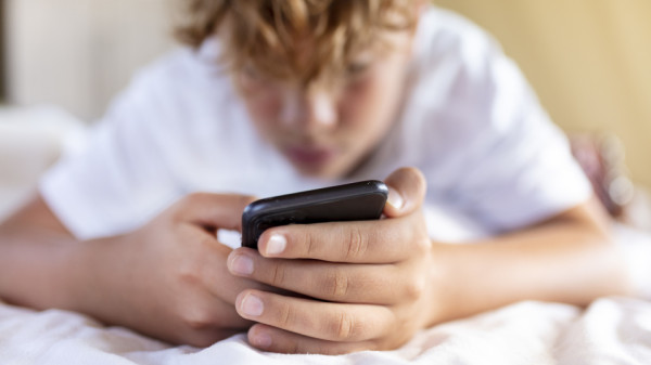 teen using a smartphone