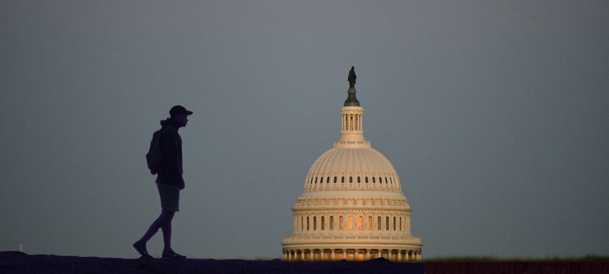 man-walking-capitol-dome